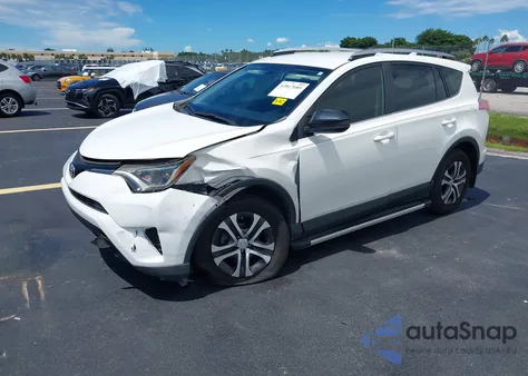 2016 Toyota Rav4 Le z USA, uszkodzony, nr VIN JTMZFREV6GD084844